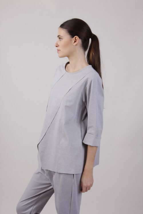 Alternative view of MAGLIA PUNTO MILANO CON TASCA LATERALE E PICCOLO SPACCO SUL DAVANTI