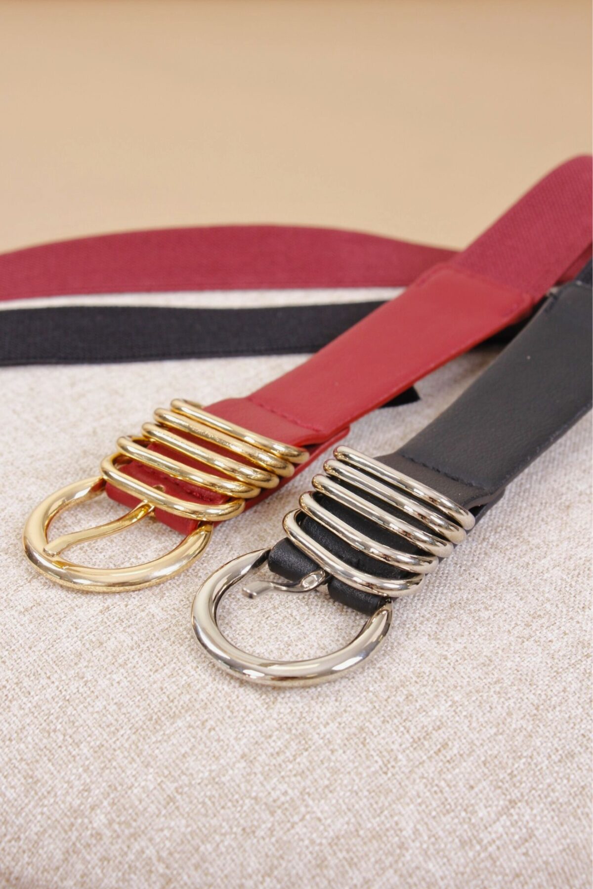 CINTURA CON ANELLI MULTIPLI