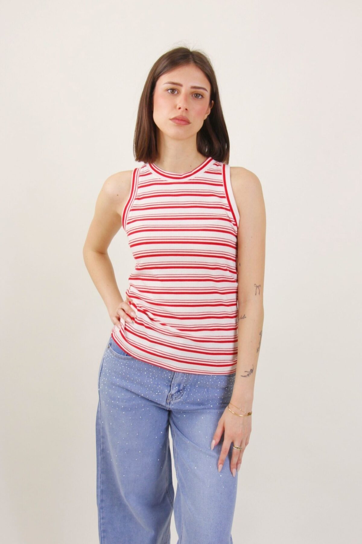 CANOTTA IN MAGLIA A COSTINE CON RIGHE