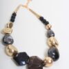 COLLANA CON ELEMENTI IRREGOLARI EFFETTO PIETRA E SFERE DORATE - Nero, TU