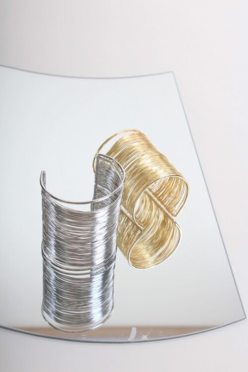 BRACCIALE RIGIDO MAXI A FILI DORATI