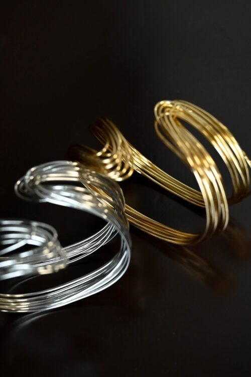 Alternative view of BRACCIALE RIGIDO CON FILI INTRECCIATI