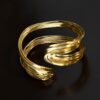 BRACCIALE RIGIDO CON FILI INTRECCIATI - Oro, TU