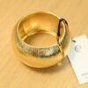 BRACCIALE RIGIDO MAXI CON SUPERFICIE LAVORATA A RILIEVO - Oro, TU