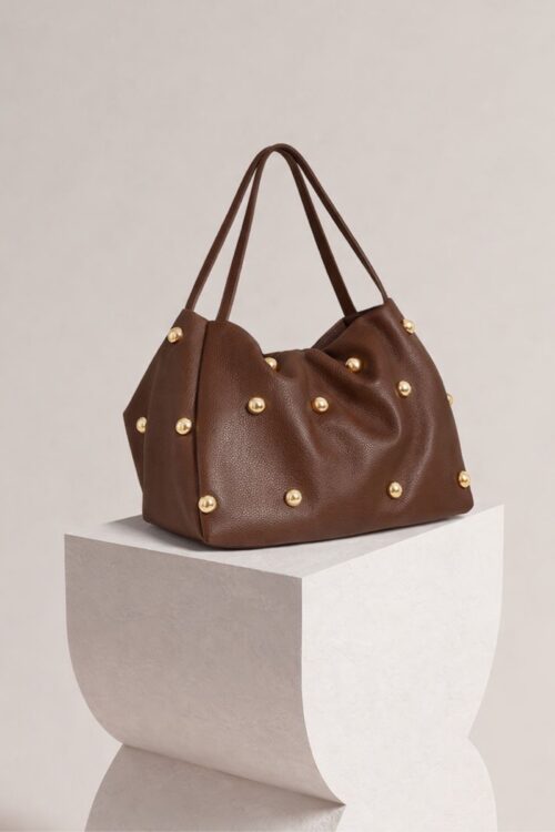 Alternative view of BORSA BAULETTO IN PELLE MARTELLATA CON SFERE METALLICHE