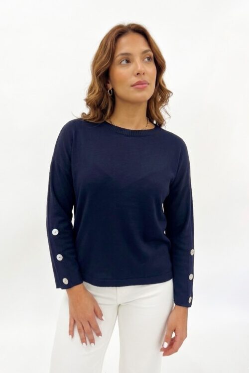 MAGLIA A MANICHE LUNGHE CON BOTTONI SUI POLSI