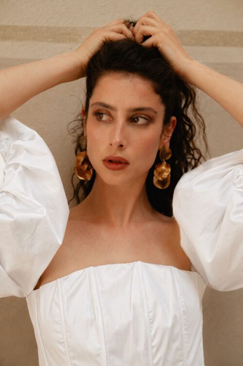 Alternative view of TOP STRAPLESS CON MANICHE VOLUME