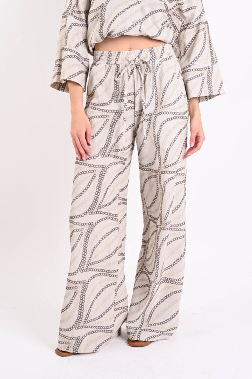 PANTALONI CON CERCHI RICAMATI