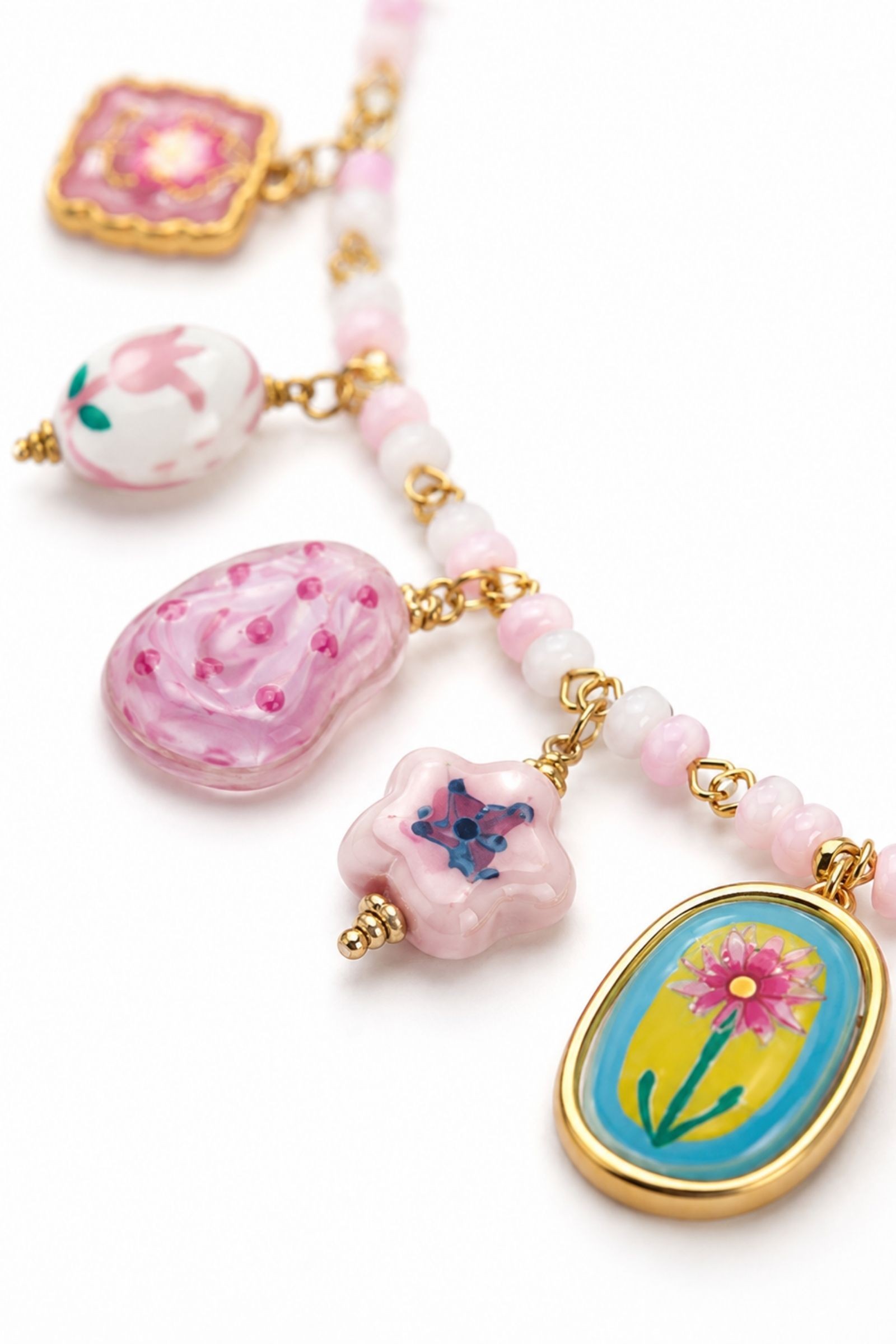 COLLANA CON CHARMS FLOREALI E PERLINE - immagine 2