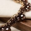 COLLANA LUNGA CON CRISTALLI SFACCETTATI E CATENE INTRECCIATE - immagine 2