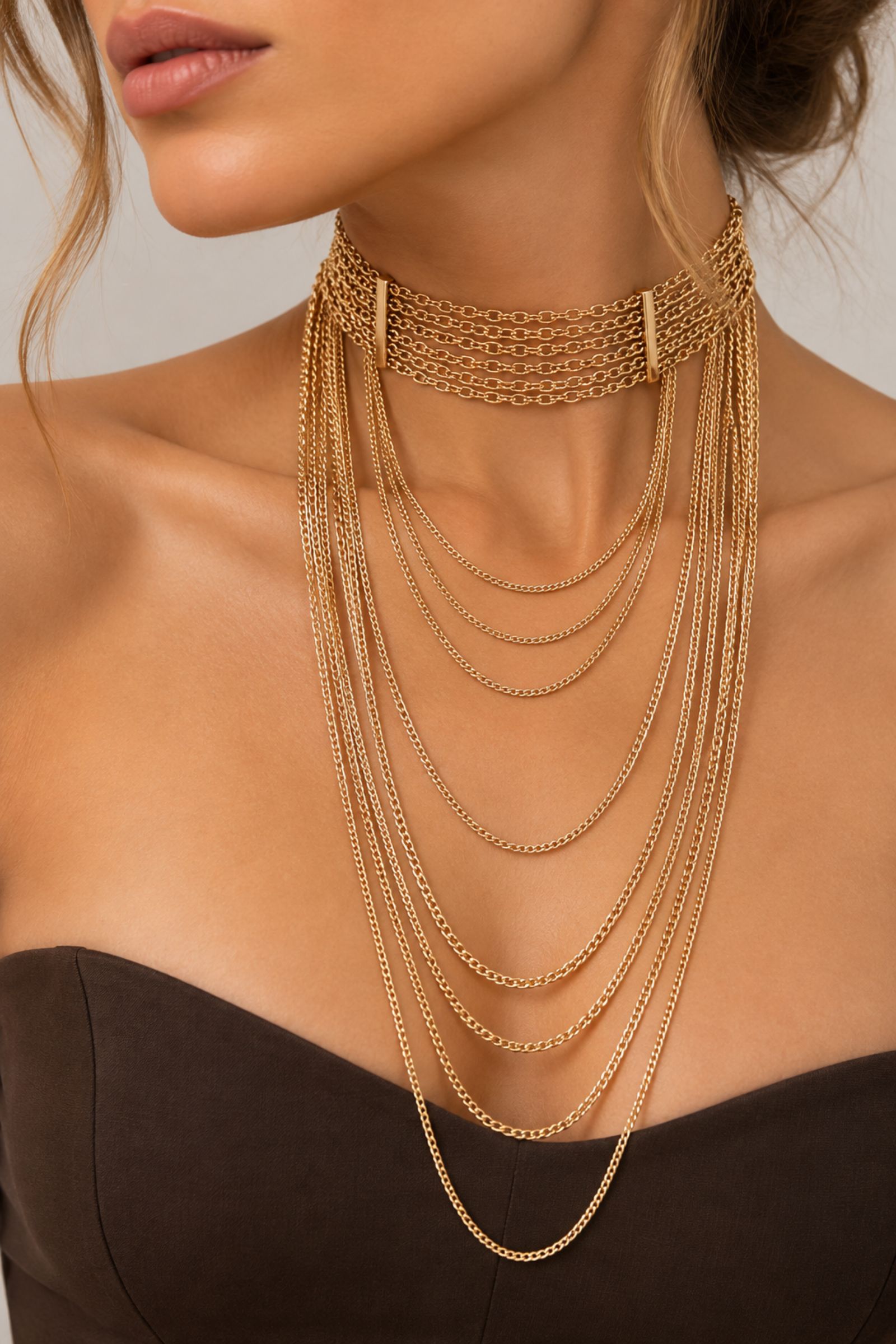 COLLANA MULTIFILO CON CATENE DORATE