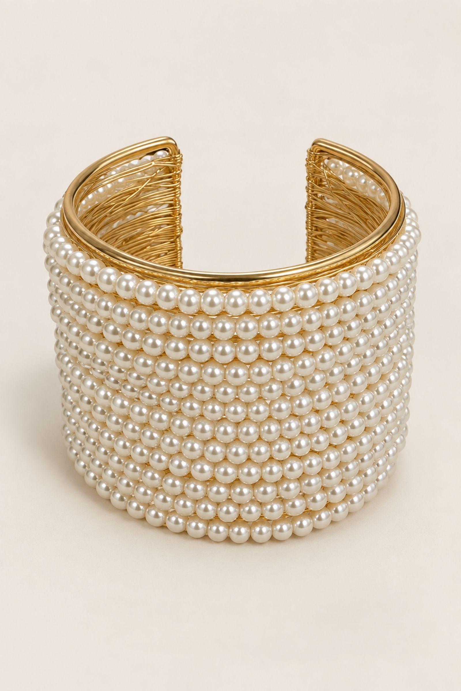 BRACCIALE RIGIDO CON PERLE