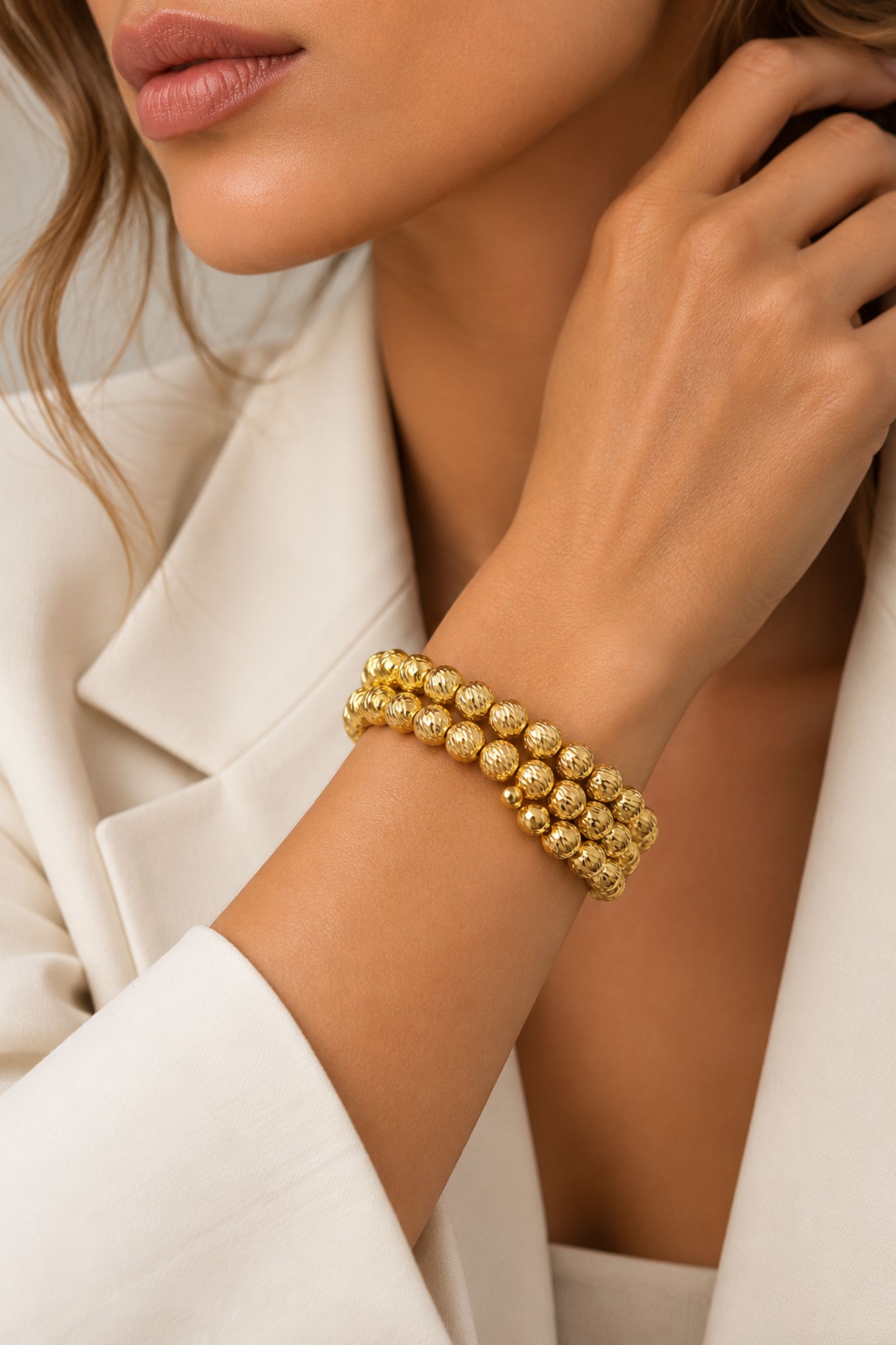 BRACCIALE MULTIFILO CON SFERE LAVORATE