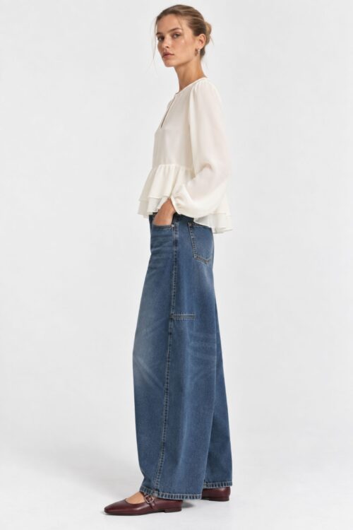 Alternative view of BLUSA SVASATA CON BALZA