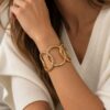 BRACCIALE RIGIDO CON CERCHI INTRECCIATI