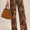 PANTALONI CON FANTASIA FLOREALE - immagine 2