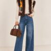 GILET IN MAGLIA FANTASIA CON BORDI EFFETTO PELLICCIA