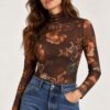 MAGLIA SEMITRASPARENTE A COLLO ALTO